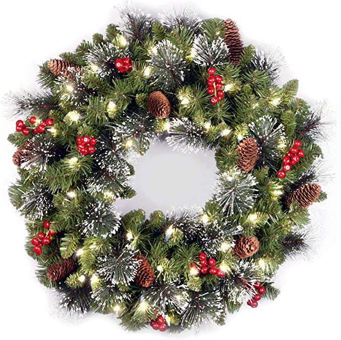 National Tree Company Pre-Lit Artificial Christmas Wreath, Green, Crestwood Spruce, White Lights, Decorated with Pine Cones, Berry Clusters, Frosted Branches, Christmas Collection, 24 Inches